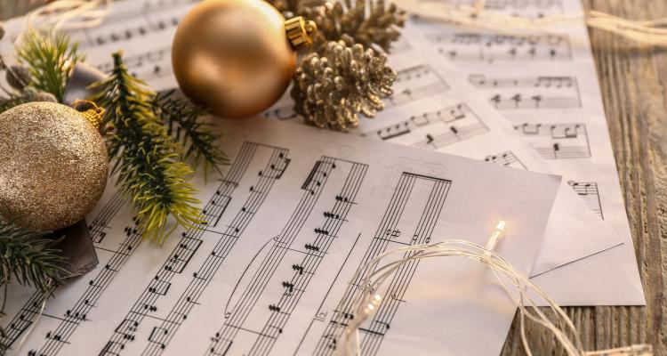 Christmas decorations on music sheets