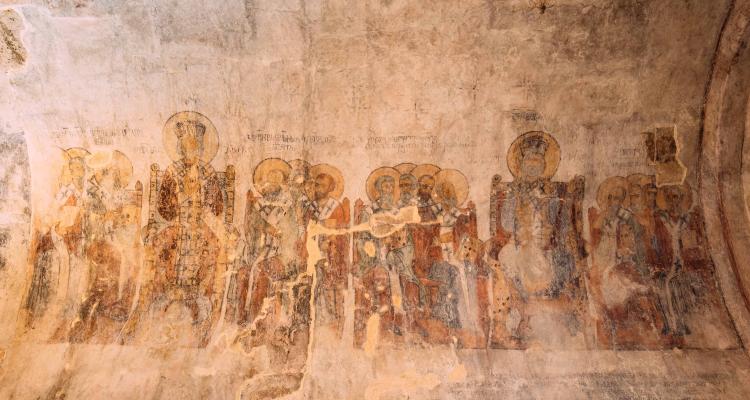  a photograph of an ancient Georgian fresco depicting the First  Council of Nicaea, 325 AD. Used with permission