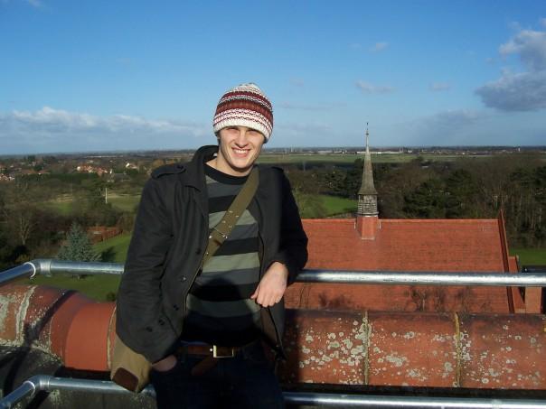 Hywel Mills pictured at the top of the Girton tower